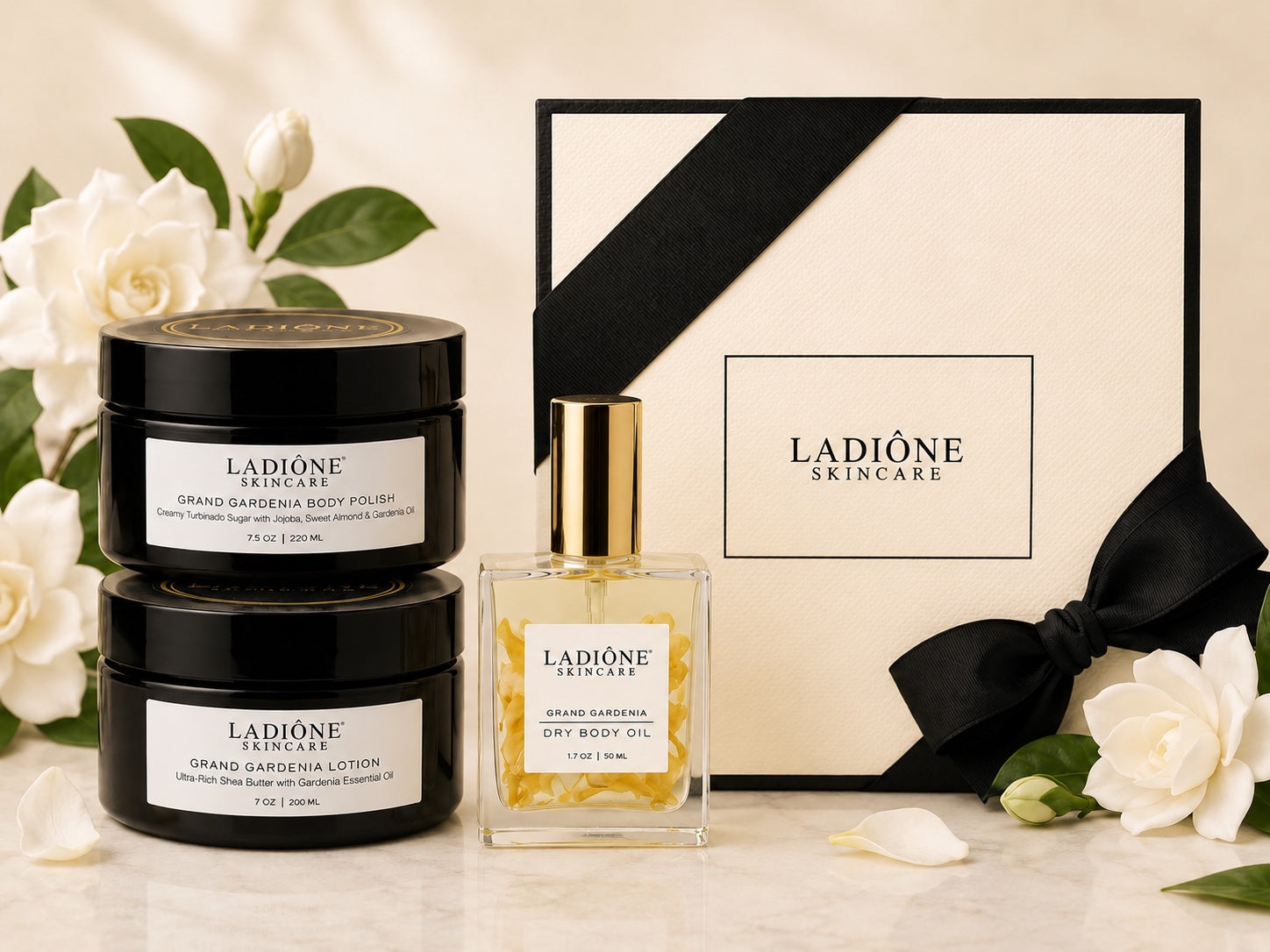Ladióne skincare products including lotion and dry body oil jars with decorative flowers on a light background.